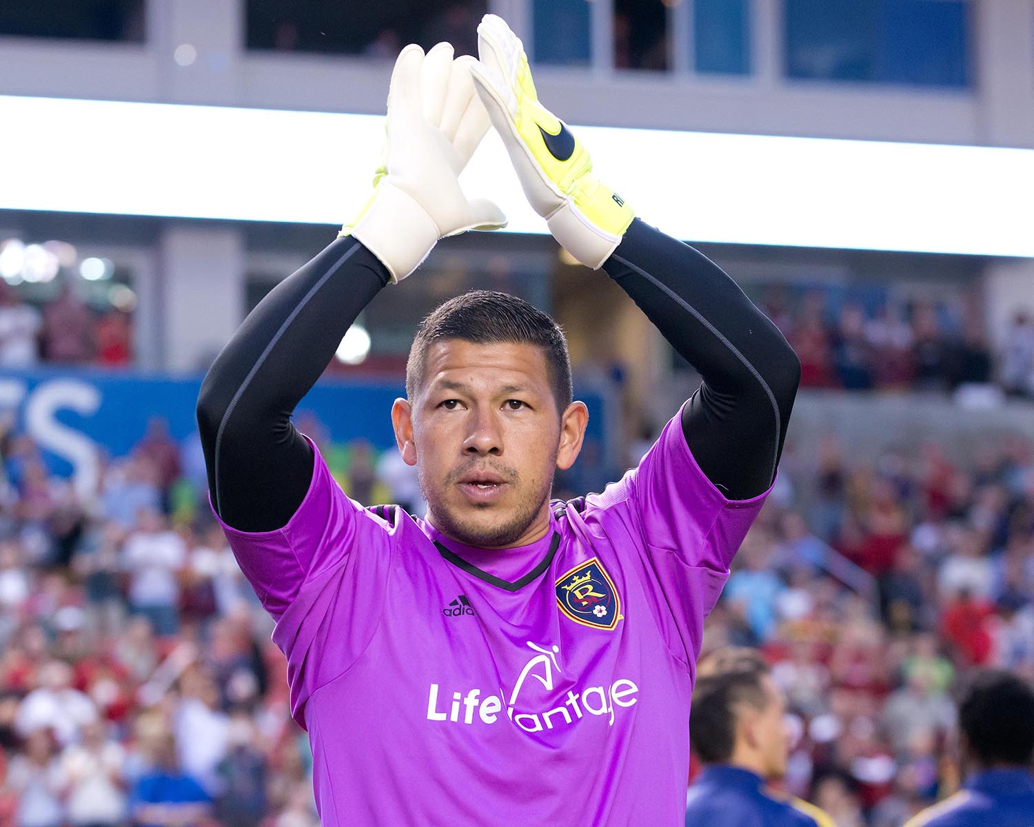 Nick Rimando applauding the fans.