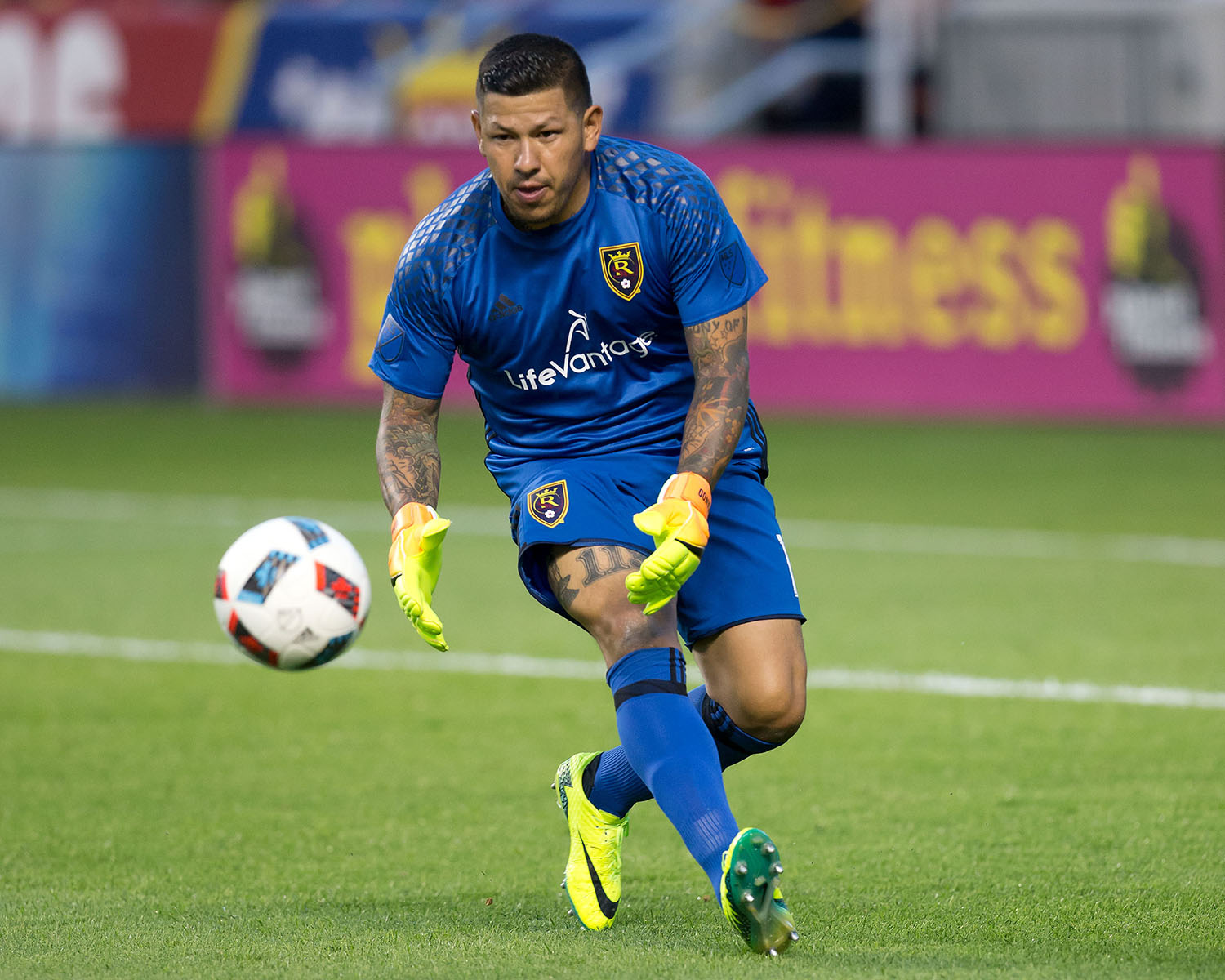 Nick Rimando fielding a ball in an MLS game.